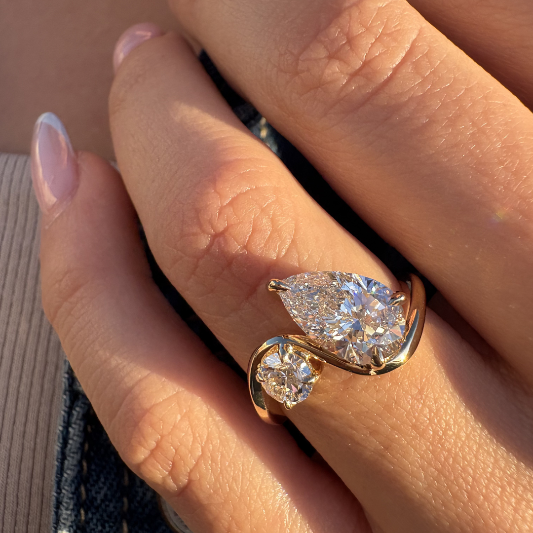 Pear and Round Diamond Twist Ring