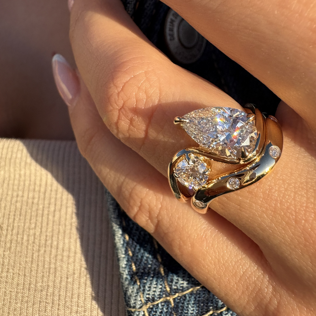 Pear and Round Diamond Twist Ring