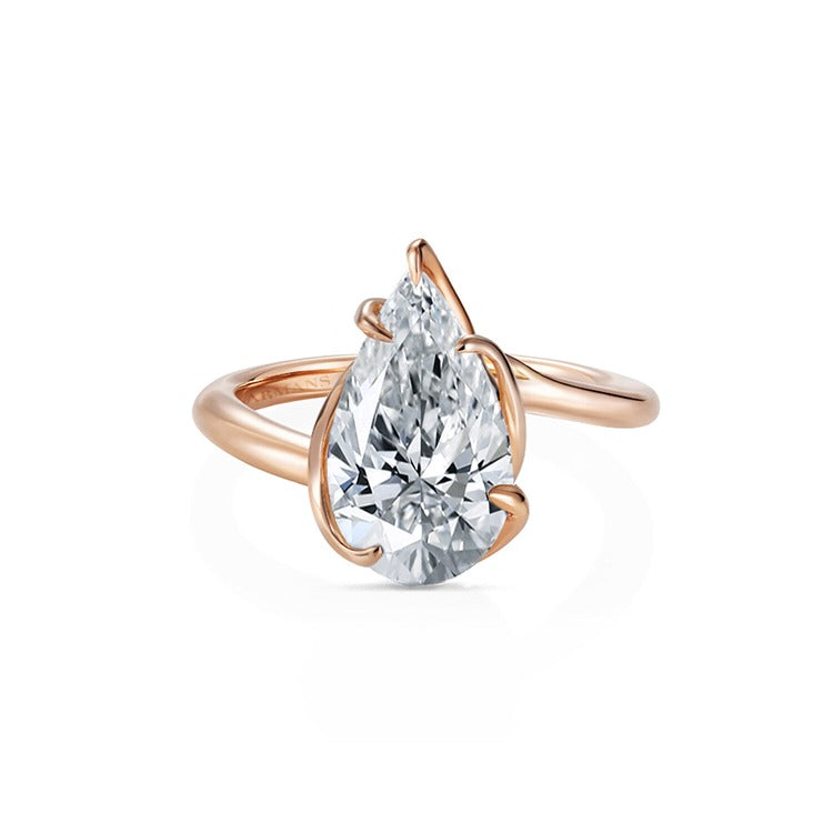 Pear shaped engagement ring shop with twisted band